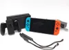 A Nintendo Switch console with its accessories, including the dock, Joy-Cons, and charging grip, is displayed against a white background. Produktbild-Vorschau