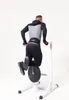 A man is performing dips with a weight belt and a weight plate attached. Náhľad obrázku produktu