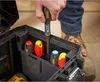 A person is placing a screwdriver into a tool box containing other screwdrivers. Voir les images du produit