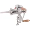 A hand is holding a metal meat grinder with a wooden handle, clamped to a surface. Podgląd zdjęcia produktu