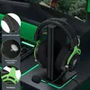 A gaming headset is displayed on a stand, with close-up insets highlighting its features. Produktbild-Vorschau