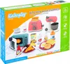 The image shows the packaging of a toy kitchen accessory set, featuring various toy kitchen appliances and food items. Produktbild-Vorschau