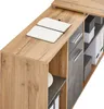 A close-up view of a desk with a notebook on top and storage compartments. Produktbild-Vorschau