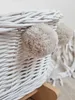 Weiße Puppenwiege aus Korbgeflecht mit Pompons und Bettzeug Produktbild-Vorschau 3