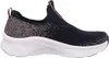 A side view of a black Skechers slip-on sneaker with a speckled gray heel and a white sole. Náhled obrázku produktu