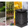 A collage of four images showing a garden lantern in different seasons: spring with tulips, summer with trees and water, autumn with yellow leaves, and winter with snow. Podgląd zdjęcia produktu