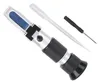 A refractometer and its accessories are laid out on a white background. Náhled obrázku produktu