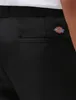 A close-up view of the back pocket of black Dickies work pants. Náhled obrázku produktu