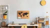 A home office setup with a desk, shelves, and a world map corkboard. Produktbild-Vorschau