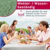 A family is having a meal outdoors, with text overlays highlighting product features. Produktbild-Vorschau