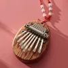 Mini kalimba - 8 touches - bois d'acajou - piano à pouces Voir les images du produit 3