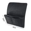 A dark gray felt bedside organizer with multiple pockets. Produktbild-Vorschau