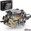 A detailed model of a W16 engine and its packaging. Voir les images du produit