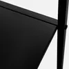 A close-up view of a black metal shelf edge and support. Anteprima dell’immagine prodotto
