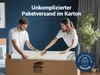 A couple is unboxing a rolled-up mattress from a cardboard box. Produktbild-Vorschau