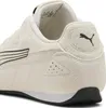 Close-up view of the heel and side of a cream-colored Puma sneaker. Produktbild-Vorschau