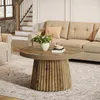 A living room scene with a coffee table in the foreground and a sofa in the background. Anteprima dell’immagine prodotto