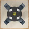 A top-down view of a round dining table set for four, with chairs around it. Anteprima dell’immagine prodotto