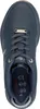 A top-down view of a single navy blue sneaker.