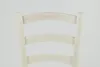 The back of a light-colored wooden chair with a woven straw seat. Produktbild-Vorschau