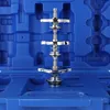 A close-up view of a radiator pressure tester tool set inside its blue plastic case. Podgląd zdjęcia produktu