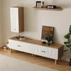 A living room setting with a wall-mounted cabinet and a long media console. Produktbild-Vorschau
