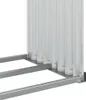 A close-up view of a silver firewood rack, showing its metallic structure and vertical supports. Náhľad obrázku produktu