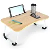 A portable laptop table with a tablet, smartphone, cup, and pens on it, set against a white background. Produktbild-Vorschau