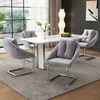A dining room set with a marble-top table and four gray upholstered chairs. Voir les images du produit