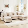 A U-shaped sectional sofa with multiple cushions and ottomans is shown in a well-lit living room setting.