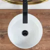 A top-down view of a white basin with a black faucet and drain, set against a wooden surface. Produktbild-Vorschau