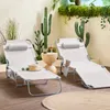 Two beige lounge chairs are set up on a wooden deck, surrounded by potted plants and cacti, creating a relaxed outdoor oasis. Voir les images du produit