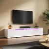 A modern living room with a TV mounted on the wall above a white high-gloss TV stand with purple LED lighting. Anteprima dell’immagine prodotto