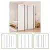 A white room divider set up in a bedroom next to a bed and a nightstand. Podgląd zdjęcia produktu