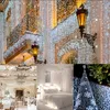 A collage of images showcasing Christmas lights used for decoration in various settings, including a building exterior, a bedroom, a wedding venue, and a Christmas tree. Anteprima dell’immagine prodotto