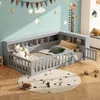 A child's bedroom with a grey corner bed, toys, and decorations. Produktbild-Vorschau