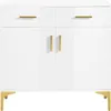 A white cabinet with gold handles and legs, set against a white background. Produktbild-Vorschau