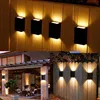 A collage of outdoor lighting fixtures, showing different installations and styles. Produktbild-Vorschau