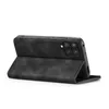 A black flip case for a smartphone is shown from a side angle, with the phone partially inserted. Produktbild-Vorschau