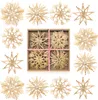 A collection of straw star ornaments arranged in a grid and scattered around it. Produktbild-Vorschau