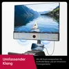 A close-up of a rowing machine's screen and speaker system, displaying a scenic image of a kayak on a lake. Produktbild-Vorschau