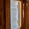 Close-up view of a wooden structure with a mesh covering a window or opening. Anteprima dell’immagine prodotto