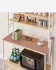 A kitchen shelf unit with various items on display, including a toaster, coffee cup, bottles, and an oven. Náhled obrázku produktu