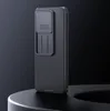 A black phone case with a sliding camera cover is displayed on a dark, curved surface against a dark background. Produktbild-Vorschau