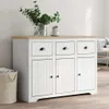 A white and brown sideboard is shown in a room with a basket and plants. Podgląd zdjęcia produktu