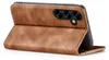 A brown leather flip case for a smartphone is shown open, with the phone inside. Produktbild-Vorschau