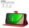 A red flip case for a smartphone is shown, with the phone displaying a green screen. Text and diagrams illustrating the stand function are at the top. Náhľad obrázku produktu