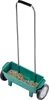 A green wheeled spreader filled with seeds, shown against a white background. Podgląd zdjęcia produktu