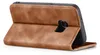 A brown leather flip case for a smartphone is shown open, revealing the phone's camera. Produktbild-Vorschau