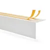 A white corner profile with yellow adhesive tape. Anteprima dell’immagine prodotto